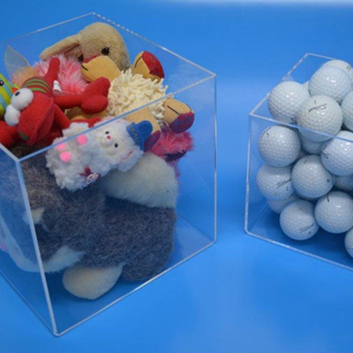 Display cubes used as dumpbins to display items like toys, golf balls, etc