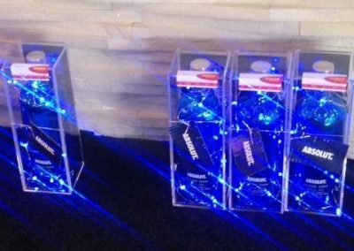 Clear acrylic product promoter and shipper with product and led lighting