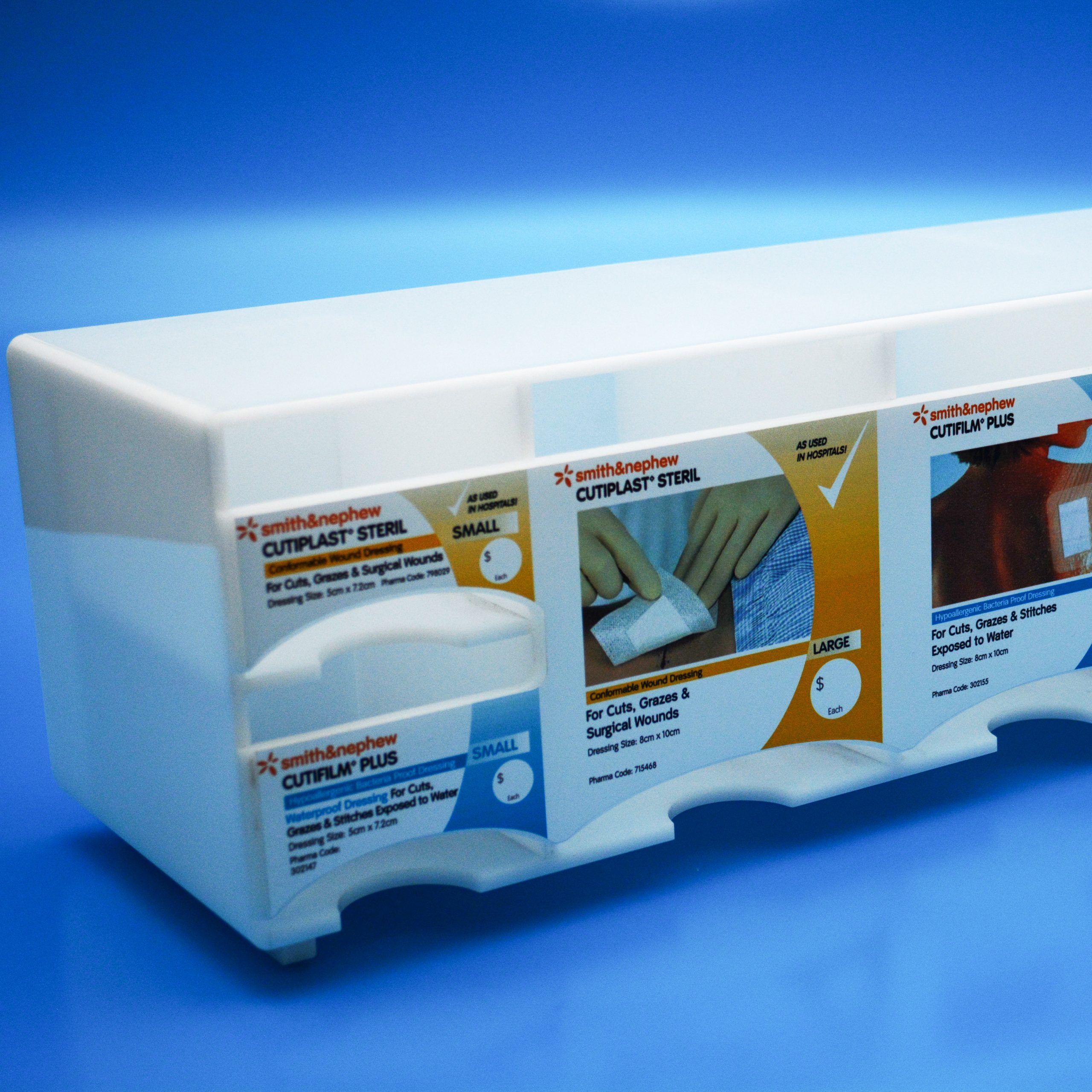 Pharmaceutical Display - Drop Feeder Design in opal acrylic with sections for different wound care products