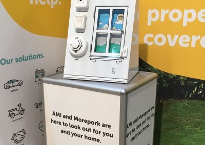 Custom Display stand with hinged display door and product adhered to the front