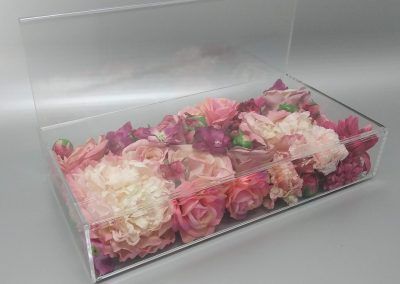 Clear acrylic display with hollow center to place products, U-folded panel for header