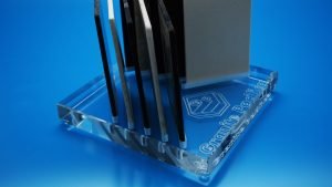 Clear acrylic block with rebates for tile samples for the manufacturing industry