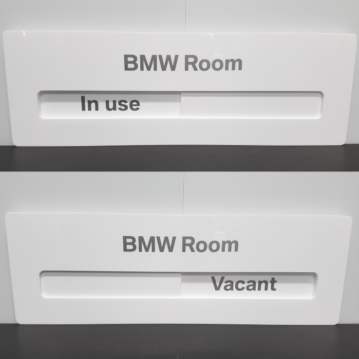 White Acrylic Sign with sliding section to show room in use or vacant
