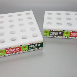 White acrylic fabricated lip balm displays with vinyl decals applied