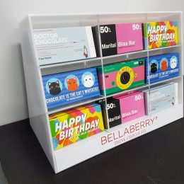 Free standing custom sectional display manufactured to house chocolate bars for the hospitality industry