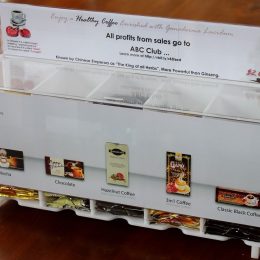 Acrylic honestly box manufactured in opal acrylic with clear acrylic sleeves for display and advertising.