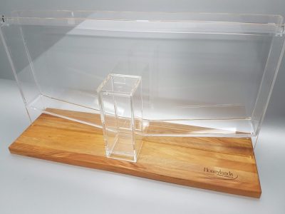 Custom clear acrylic honey dripper glued to engraved wooden base