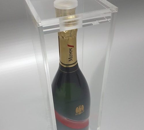 Clear acrylic wine display box housing a bottle of Mumm.