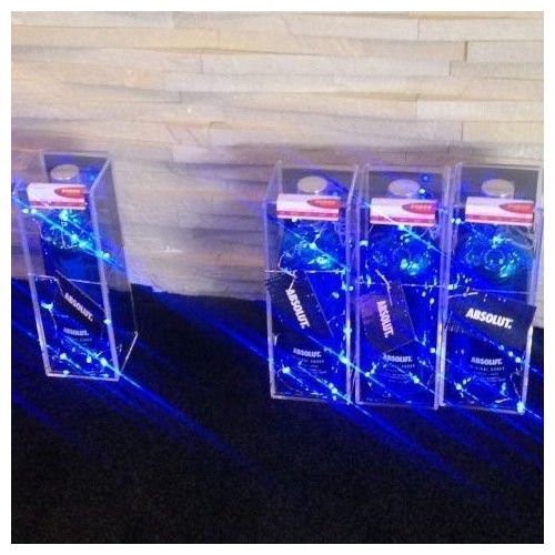 Clear acrylic product promoter and shipper with product and led lighting
