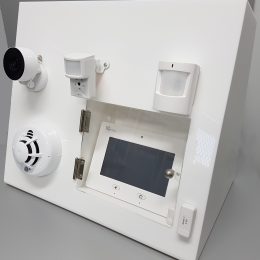 White acrylic product demonstration display with functioning products