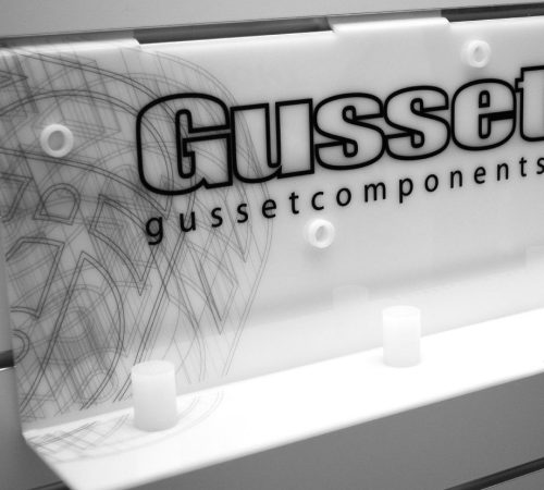 White acrylic slatwall display unit with custom graphics