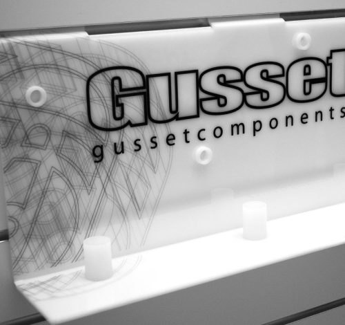 White acrylic slatwall display unit with custom graphics