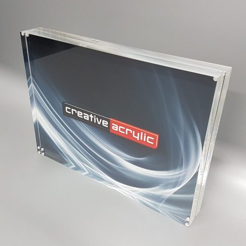 Magnetic Frames clear acrylic magnetic picture frame used to sandwich items between two slabs of acrylic.