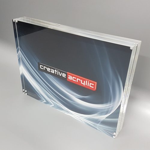 Magnetic Frames clear acrylic magnetic picture frame used to sandwich items between two slabs of acrylic.