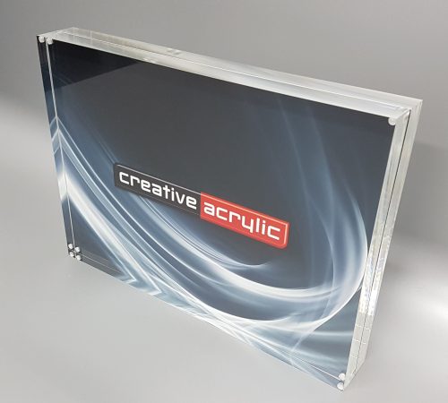 Magnetic Frames clear acrylic magnetic picture frame used to sandwich items between two slabs of acrylic.