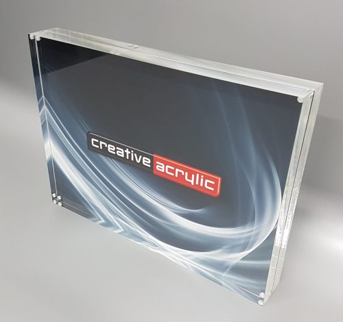 Magnetic Frames clear acrylic magnetic picture frame used to sandwich items between two slabs of acrylic.