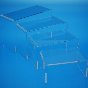 Risers Clear acrylic risers manufactured in four different sizes to raise and promote products