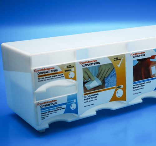Pharmaceutical Display - Drop Feeder Design in opal acrylic with sections for different wound care products