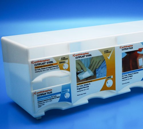 Pharmaceutical Display - Drop Feeder Design in opal acrylic with sections for different wound care products