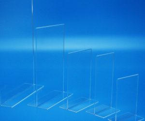 Sign Holders Portrait vertical menu holders manufactured in clear acrylic and showing a range of available sizes.