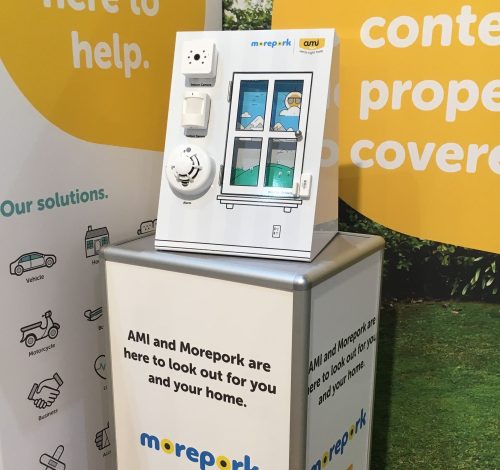 Custom Display stand with hinged display door and product adhered to the front