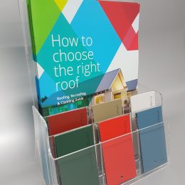 Custom acrylic brochure holder with individual pockets for samples