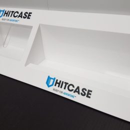 White acrylic display unit with clear acrylic panels and vinyl decals