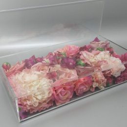 Clear acrylic display with hollow center to place products, U-folded panel for header