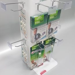 White acrylic product display with removable metal hooks