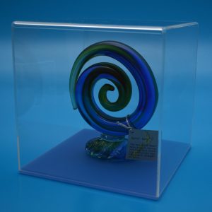 5-sided clear acrylid display cube with a custom blue acrylic base, housing a glass sculpture