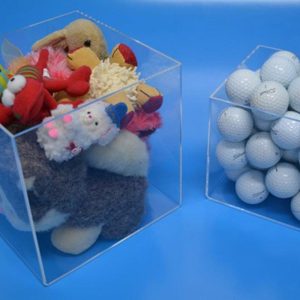5-sided clear acrylic display cubes used upside down as dump bins to hold multiple loose items.