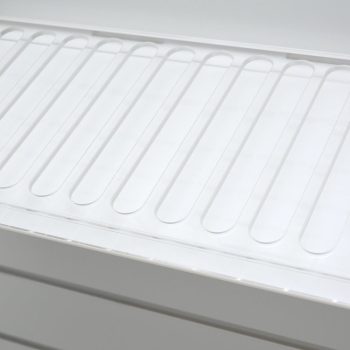 Opal acrylic slatwall display unit with a clear acrylic tray with slots to allow products to slide down to the front.